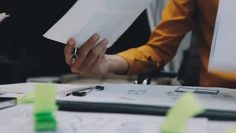 Team of UI UX web designer are working together to develop mobile responsiv.. Stock Footage 330333912