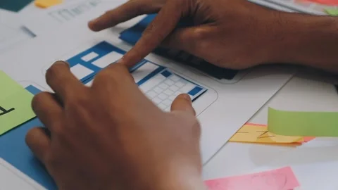 Team of UI UX web designer are working together to develop mobile responsiv.. Stock Footage 330333918