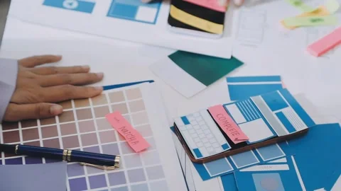 Team of UI UX web designer are working together to develop mobile responsiv.. Stock Footage 330333931