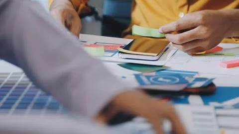 Team of UI UX web designer are working together to develop mobile responsiv.. Stock Footage 330333936