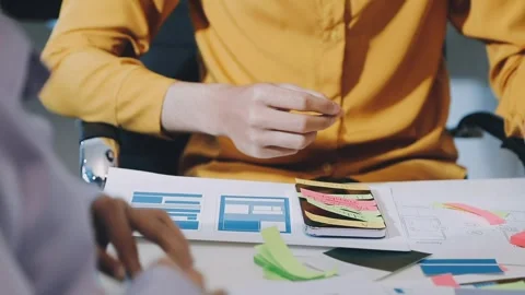 Team of UI UX web designer are working together to develop mobile responsiv.. Stock Footage 330333941