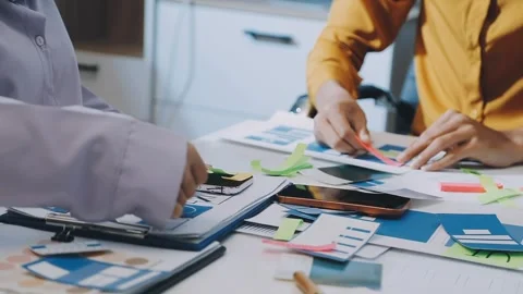 Team of UI UX web designer are working together to develop mobile responsiv.. Stock Footage 330333948