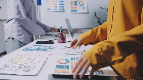 Team of UI UX web designer are working together to develop mobile responsiv.. Stock Footage 336485812