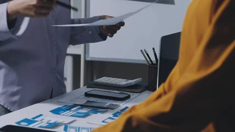 Team of UI UX web designer are working together to develop mobile responsiv.. Stock Footage 336485841