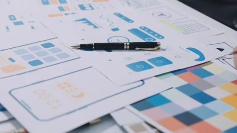Team of UI UX web designer are working together to develop mobile responsiv.. Stock Footage 336485872