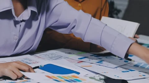 Team of UI UX web designer are working together to develop mobile responsiv.. Stock Footage 336485878