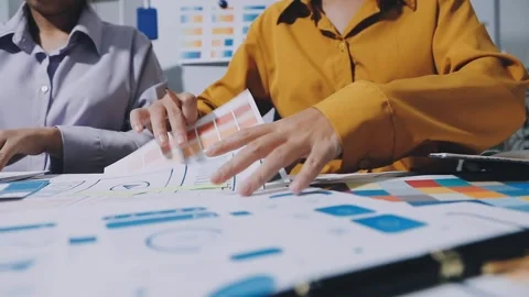 Team of UI UX web designer are working together to develop mobile responsiv.. Stock Footage 336485881