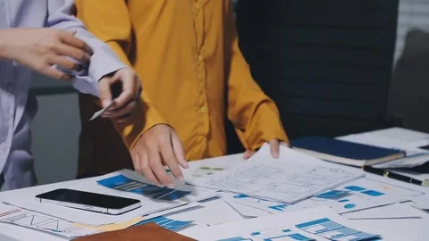 Team of UI UX web designer are working together to develop mobile responsiv.. Stock Footage 336485916