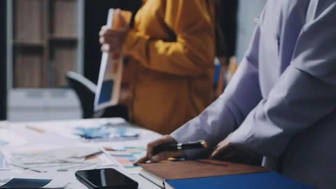 Team of UI UX web designer are working together to develop mobile responsiv.. Stock Footage 336485925