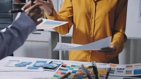 Team of UI UX web designer are working together to develop mobile responsiv.. Stock Footage 336485941