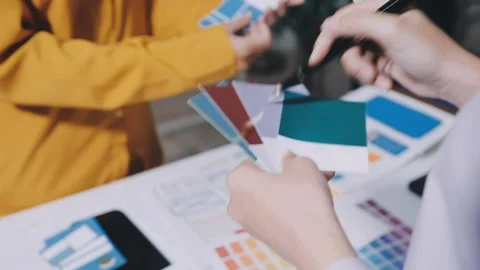 Team of UI UX web designer are working together to develop mobile responsiv.. Stock Footage 336485957