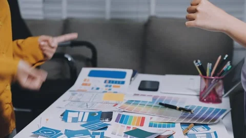 Team of UI UX web designer are working together to develop mobile responsiv.. Stock Footage 336485960