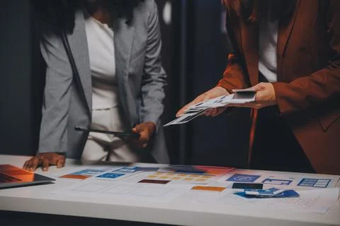 Team of UI UX web designer are working together to develop mobile responsiv.. Stock Photos