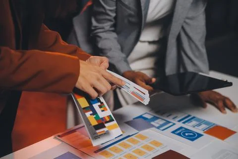Team of UI UX web designer are working together to develop mobile responsiv.. Stock Photos