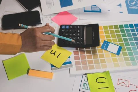 Team of UI UX web designer are working together to develop mobile responsiv.. Stock Photos