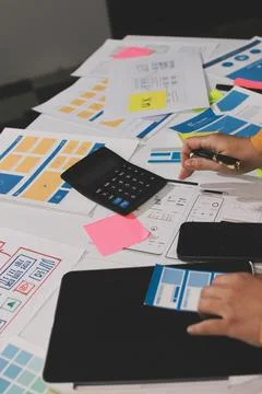 Team of UI UX web designer are working together to develop mobile responsiv.. Stock Photos