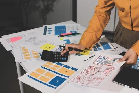Team of UI UX web designer are working together to develop mobile responsiv.. Stock Photos
