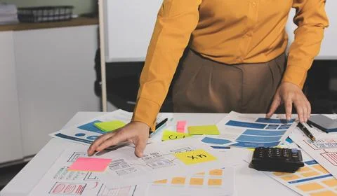Team of UI UX web designer are working together to develop mobile responsiv.. Stock Photos