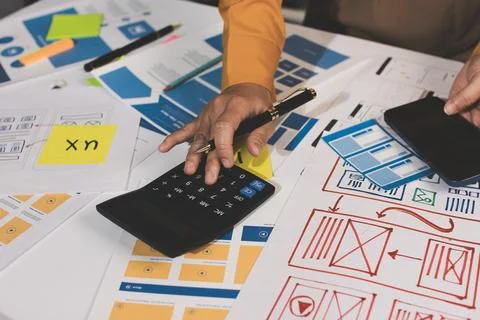 Team of UI UX web designer are working together to develop mobile responsiv.. Stock Photos