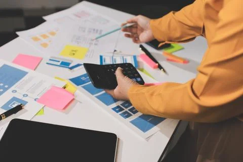 Team of UI UX web designer are working together to develop mobile responsiv.. Stock Photos