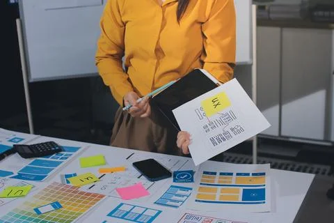 Team of UI UX web designer are working together to develop mobile responsiv.. Stock Photos