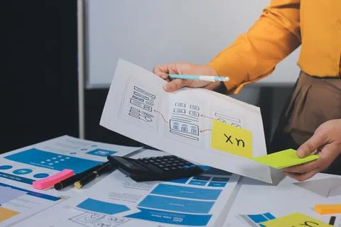Team of UI UX web designer are working together to develop mobile responsiv.. Stock Photos