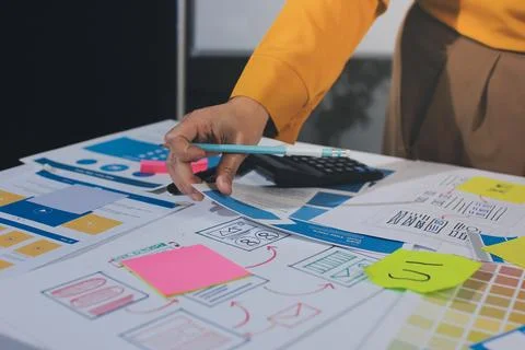 Team of UI UX web designer are working together to develop mobile responsiv.. Stock Photos