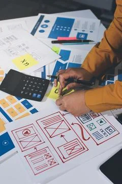 Team of UI UX web designer are working together to develop mobile responsiv.. Stock Photos