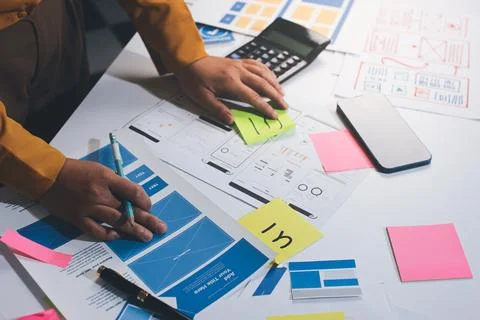 Team of UI UX web designer are working together to develop mobile responsiv.. Stock Photos