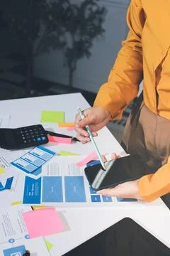 Team of UI UX web designer are working together to develop mobile responsiv.. Stock Photos