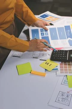 Team of UI UX web designer are working together to develop mobile responsiv.. Stock Photos
