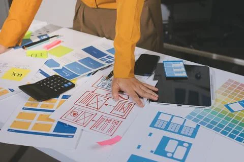 Team of UI UX web designer are working together to develop mobile responsiv.. Stock Photos