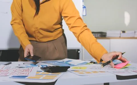 Team of UI UX web designer are working together to develop mobile responsiv.. Stock Photos