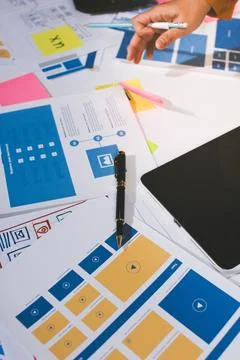 Team of UI UX web designer are working together to develop mobile responsiv.. Stock Photos