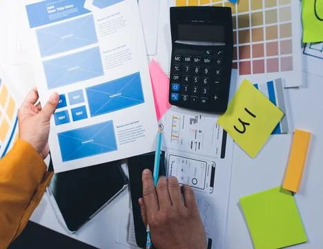 Team of UI UX web designer are working together to develop mobile responsiv.. Stock Photos