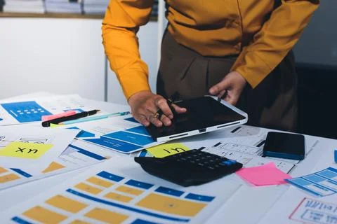 Team of UI UX web designer are working together to develop mobile responsiv.. Foto stock