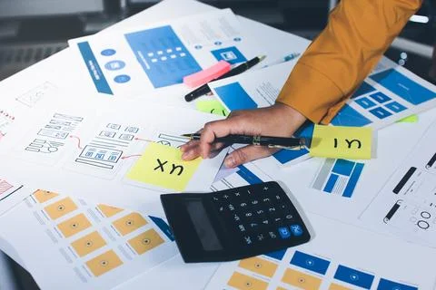 Team of UI UX web designer are working together to develop mobile responsiv.. Stock Photos