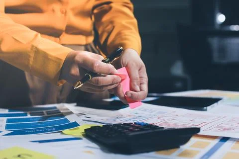 Team of UI UX web designer are working together to develop mobile responsiv.. Stock Photos