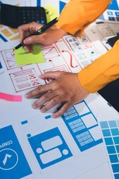 Team of UI UX web designer are working together to develop mobile responsiv.. Stock Photos