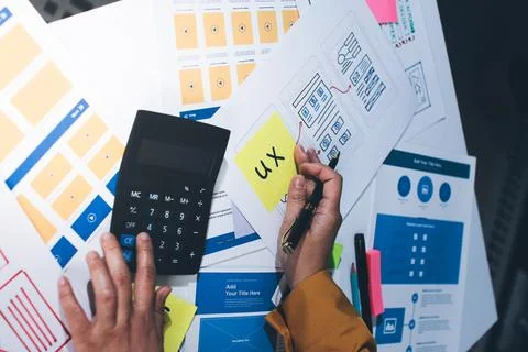 Team of UI UX web designer are working together to develop mobile responsiv.. Stock Photos
