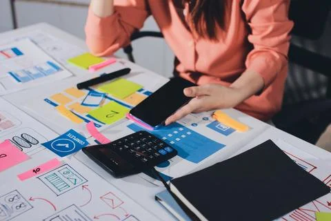 Team of UI UX web designer are working together to develop mobile responsiv.. Stock Photos