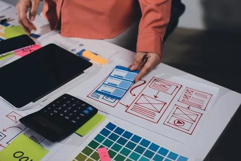 Team of UI UX web designer are working together to develop mobile responsiv.. Stock Photos