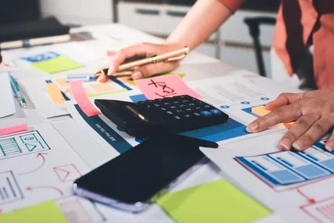 Team of UI UX web designer are working together to develop mobile responsiv.. Stock Photos