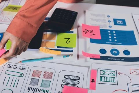 Team of UI UX web designer are working together to develop mobile responsiv.. Stock Photos