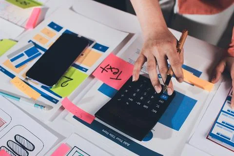 Team of UI UX web designer are working together to develop mobile responsiv.. Stock Photos