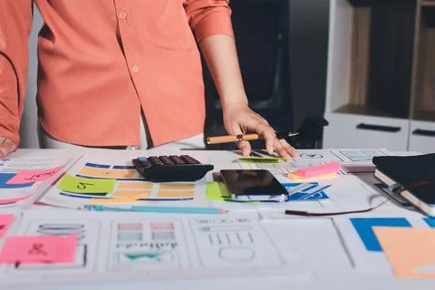 Team of UI UX web designer are working together to develop mobile responsiv.. Stock Photos