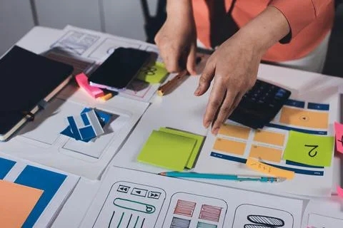 Team of UI UX web designer are working together to develop mobile responsiv.. Stock Photos