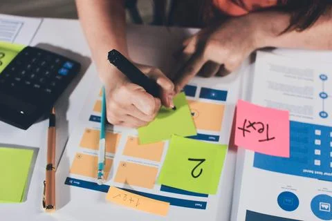 Team of UI UX web designer are working together to develop mobile responsiv.. Stock Photos