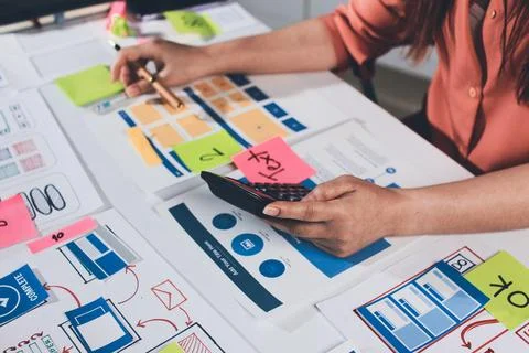 Team of UI UX web designer are working together to develop mobile responsiv.. Stock Photos