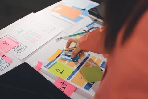 Team of UI UX web designer are working together to develop mobile responsiv.. Stock Photos